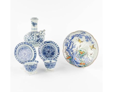 A plate, Kendi and teacups with saucers, Chinese porcelain, blue-white and polychrome. 19th/20th century.&nbsp;Dimensions:(D: