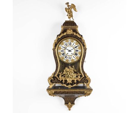 A large Cartel clock on a pedestal signed Gudin à Paris.Boulle inlay and mounted with gilt bronze.&nbsp;Movement signed 'Vinc