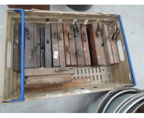 A box of vintage moulding planes