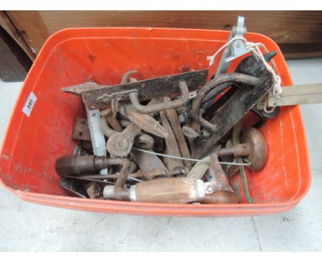A box of miscellaneous tools and fitting