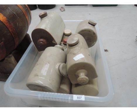 A box of ceramic bedwarmers