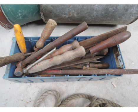 A box of vintage hand tools