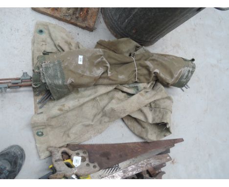 A vintage tent and kit bag