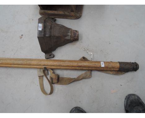 A vintage wooden tripod