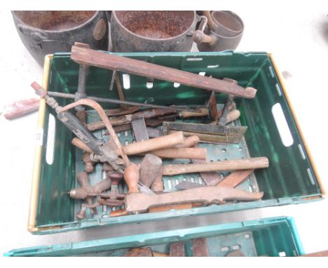 A box of vintage woodworking tools
