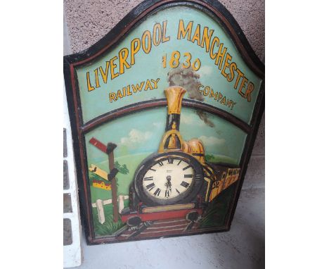 A reproduction railway sign/clock