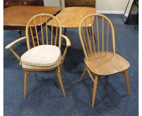 Ercol dining table, 4 dining chairs and one elbow.