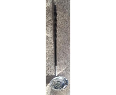 Baleen and silver toddy ladle with George III shilling to bowl.