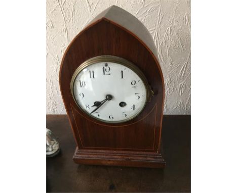 Mahogany mantle clock with French movement striking on a gong