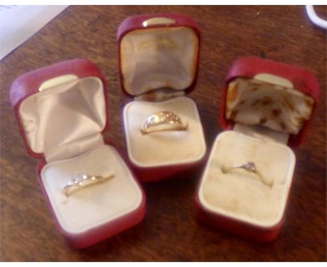 Three ladies dress rings inc. gold and diamonds (1 missing stone)