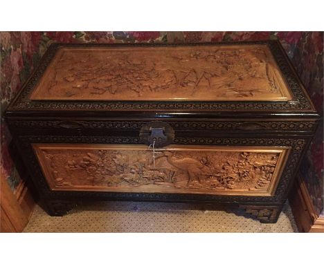 Deeply carved oriental trunk with glued top 101cm w x 53cm d x 58cm h
