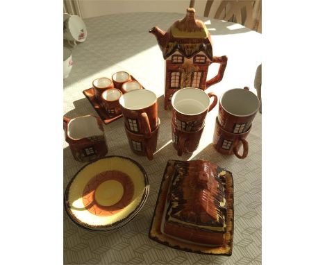 Price cottage ware tea service. - 6 cups and saucers, 4 egg cups, butter dish, coffee pot and milk jug.