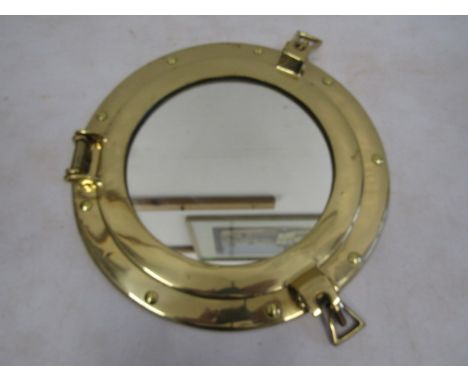 Ship's porthole mirror with brass surround 29cm dia