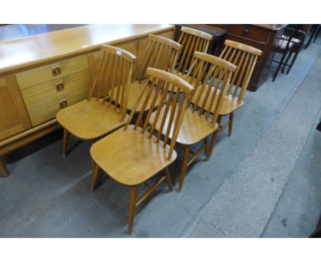A set of six Ercol style dining chairs 