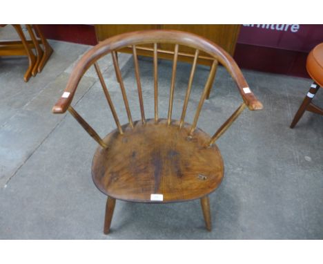 A small Ercol spindle back armchair 