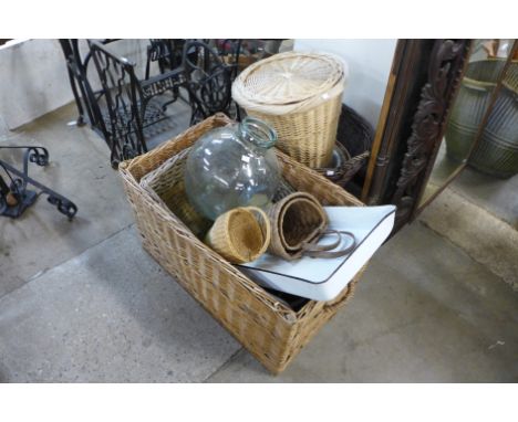 Assorted wicker baskets, enamel wares, glass carboy, etc. 
