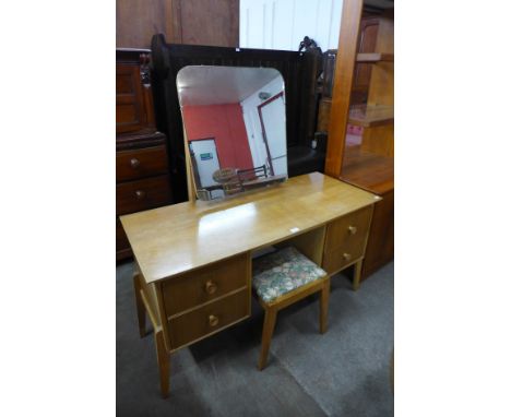 A Meredew light oak dressing table and stool 