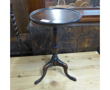 A mahogany tripod wine table 