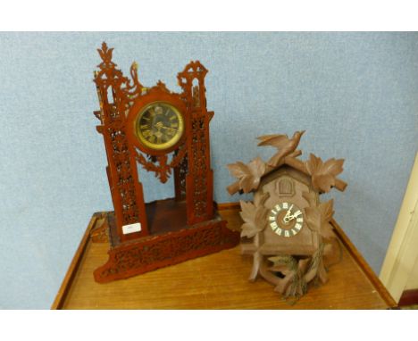 A Black Forest cuckoo clock and a French fretwork clock case, a/f 
