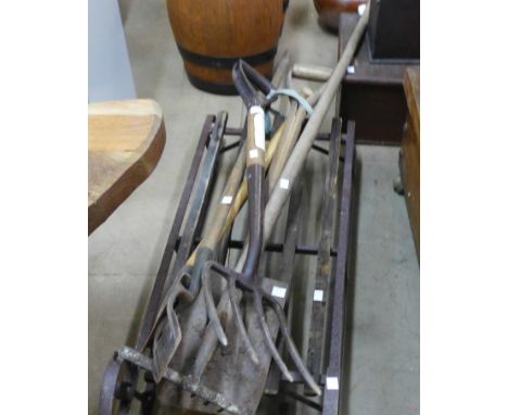 A sledge and assorted garden tools