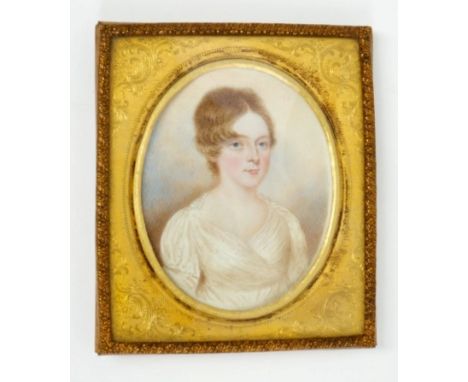 Regency oval portrait miniature on ivory - a young lady in white dress, in gilt metal mounted frame, 6.2cm x 4.9cm