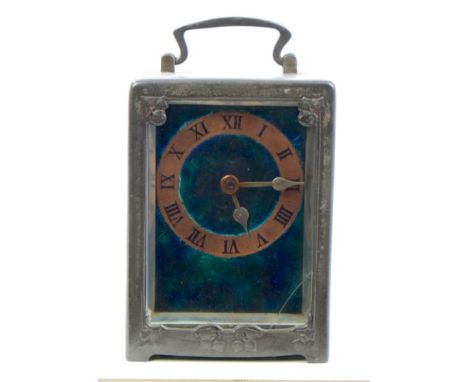 Carriage clock to a design by Archibald Knox for Liberty & Co., eight day French movement with fixed winder, peacock blue / g