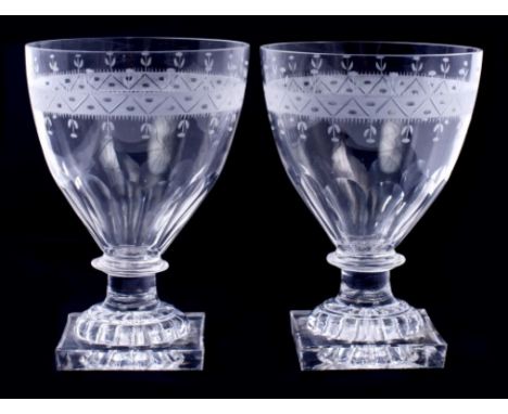 Pair of Georgian glass rummers with etched bands and facet cut decoration, knopped stem on moulded square lemon squeezer base