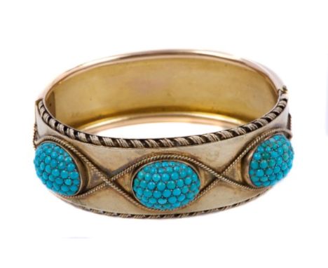 Victorian Etruscan revival hinged bangle with three pavé set turquoise cabochon panels within rope-twist borders CONDITION RE