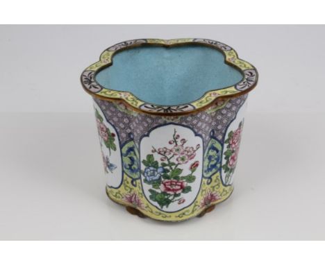 Canton enamel jardiniere of lobed form, decorated with floral reserve panels