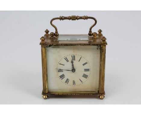 Early 20th century carriage clock with eight day movement, cylinder escapement and white enamel dial with Roman numerals in a