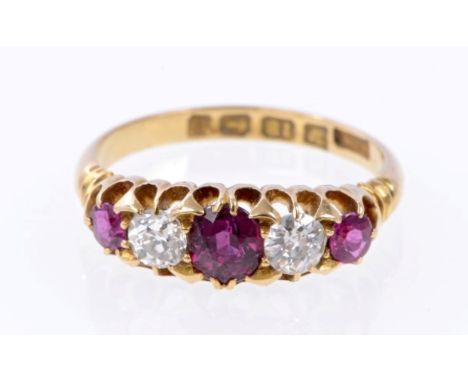 Late Victorian gold (18ct) ruby and diamond five stone ring with three round mixed cut rubies and two old cut diamonds in gol