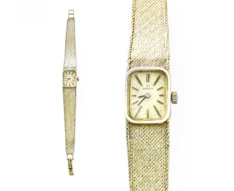 A Lady's 9 Carat White Gold Omega Wristwatch, manual wound lever movement, integral textured braceletProvenance: The Doctor E