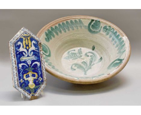 A 19th/20th Century Slipware Bowl, 43cm, a 17th/18th century Faience tile, 27cm and an early 20th century Cameo glass vase, 2