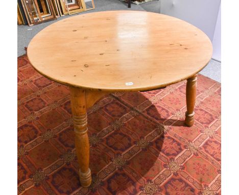 A Victorian Pine Cricket Table, raised on splade ring turn supports, 104cm by 72cm 