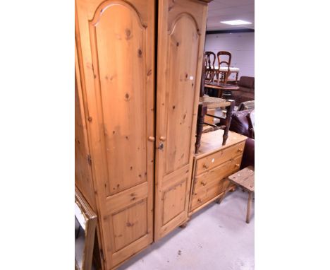 A modern pine wardrobe and bedroom chest