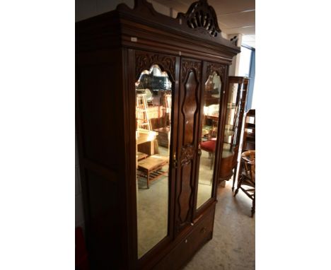 An Edwardian Burr Walnut wardrobe