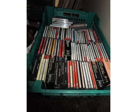 A crate of compact discs of classical interest.