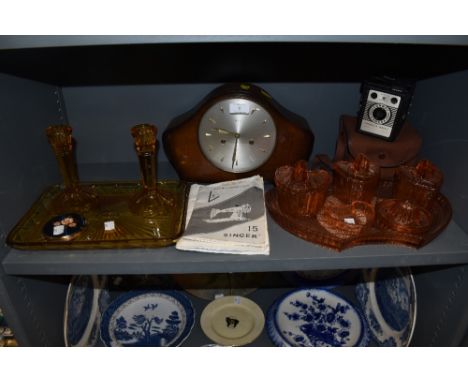 A selection of vintage items including colourful pressed glass dressing table sets,Conway camera and mantel clock.