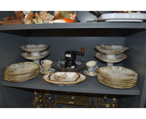A good quantity of French plates and cake stands having floral pattern and gilt detailing,two Royal Albert dishes, art deco c