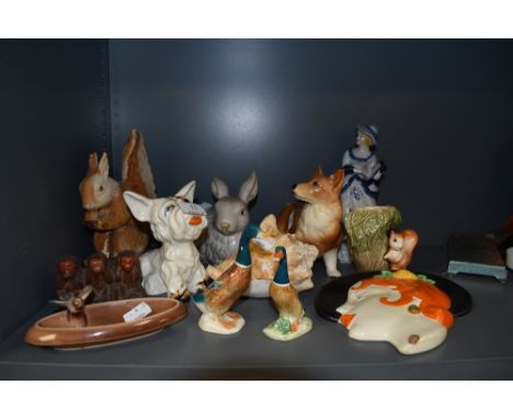 A mixed lot of vintage ceramics including Crown Devon Westie,ducks,corgi and more,also a stylised art deco wall plaque depict