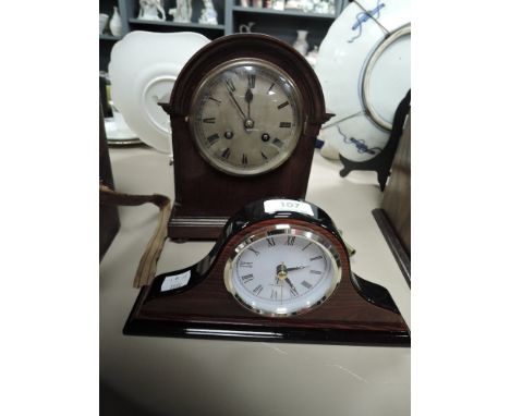 A small antique bracket or mantle clock with oak case and similar modern example