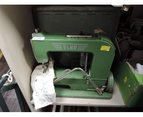 A vintage Swiss manufactured Elna 1(1940-52) sewing machine and case.