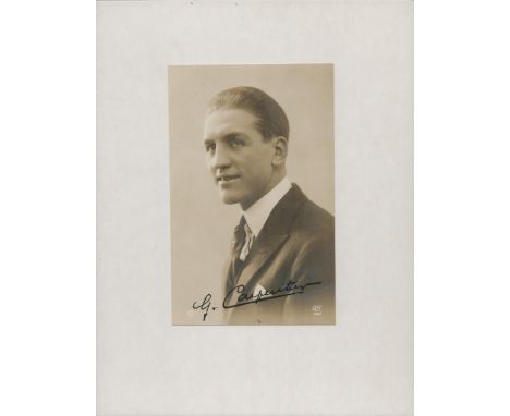Georges Carpentier signed vintage black and white photo on a white card. Vintage head and shoulders postcard image of Carpent