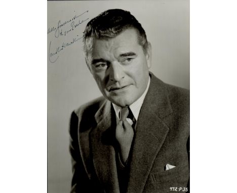 Jack Hawkins signed vintage half-length black and white photo. Dedicated. Was an English Actor who worked on stage and in fil
