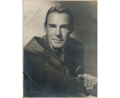 Randolph Scott signed vintage oversize photo (14x11) from early in his career. Good condition. All autographs are genuine han
