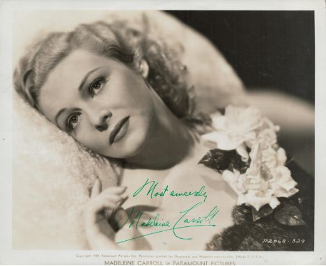Madeleine Carroll signed vintage Black and white photo in Paramount Pictures. 10 x 8 Inch. Late 1930s era. Good condition. Al