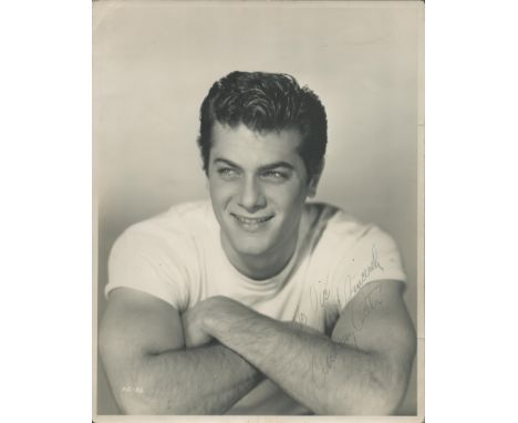 Tony Curtis signed vintage oversize b/w photo (14x11) from early in his career, unusually signed Anthony Curtis. Dedicated Wa