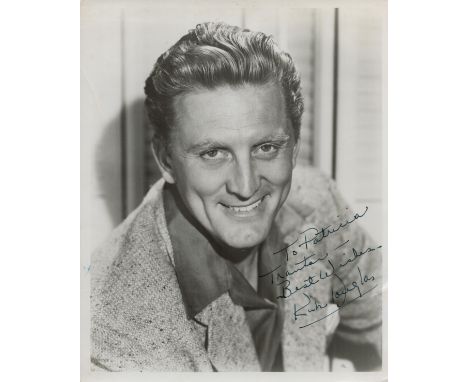 Kirk Douglas signed vintage black and white photo smiling head and shoulders portrait. 10x8 Inch. Was an American actor and f