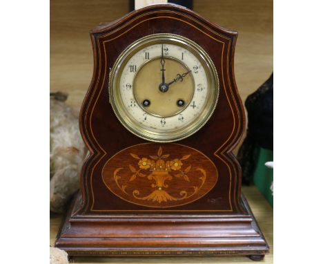 A mahogany mantel clock
