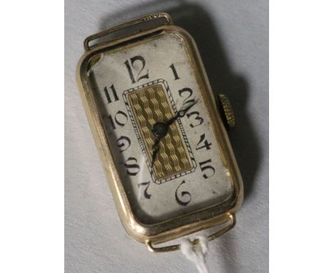 A lady's 9ct gold rectangular manual wind wrist watch (no strap).